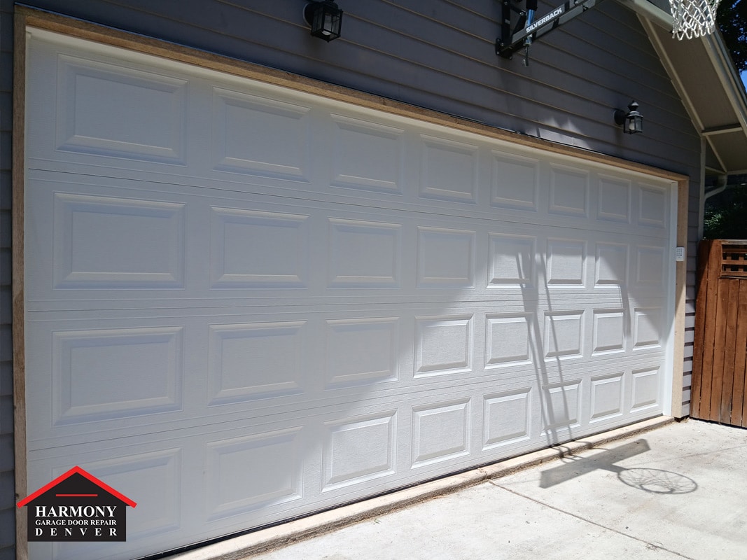 Two Single Garage Doors Converted to One Large Garage Door in West Highland, Denver